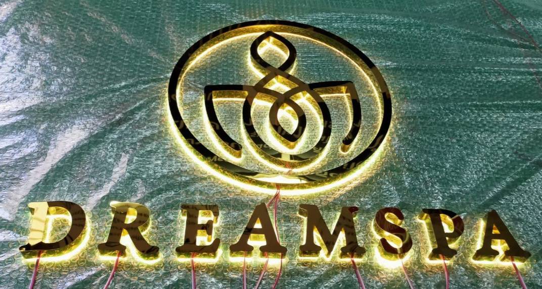 #ป้ายอักษรไฟออกหลัง #ป้ายอักษรสแตนเลสหน้าทองเงาไฟออกหลัง