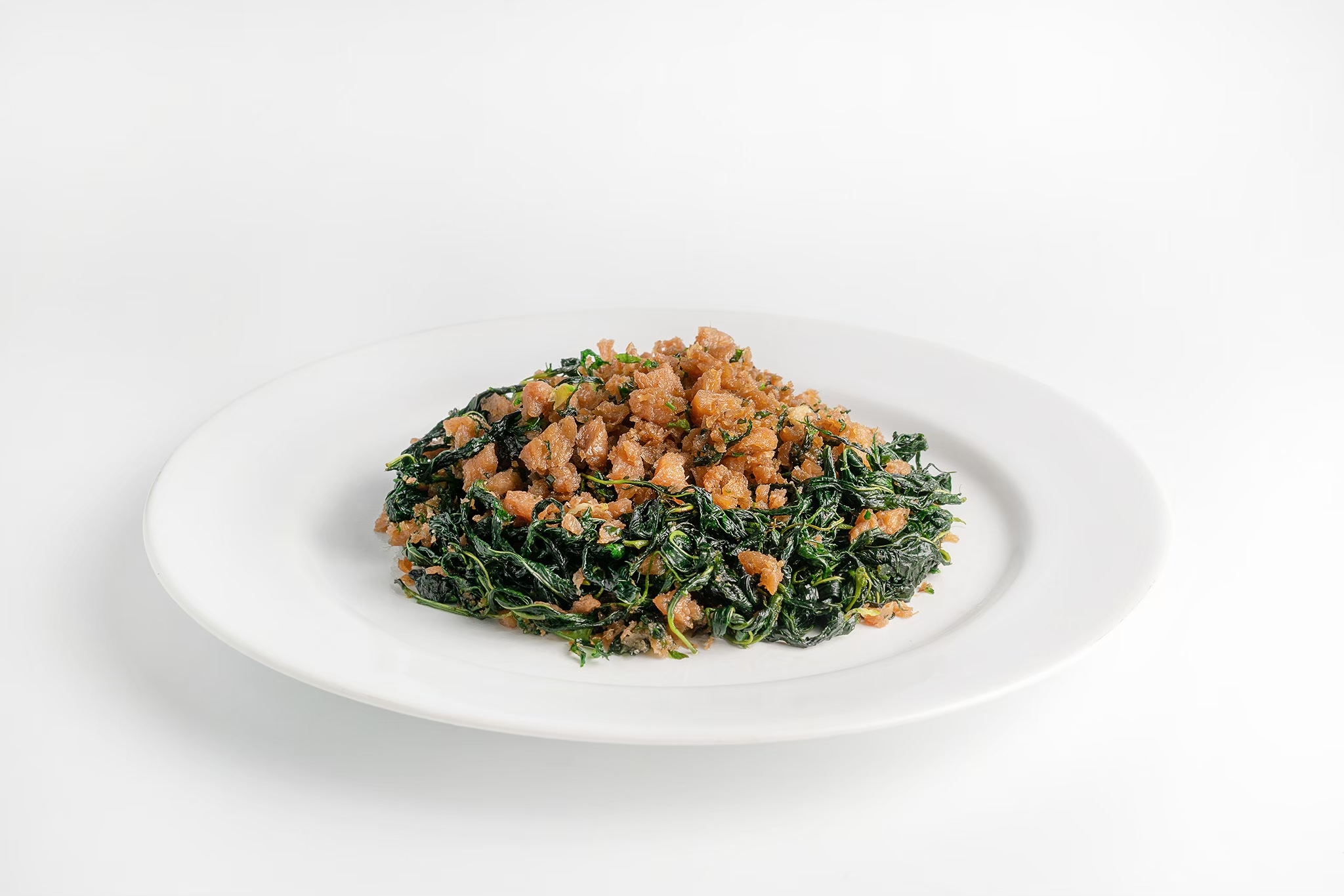 ผัดใบปอ (Stir fried juite leaves with vegan porkless)