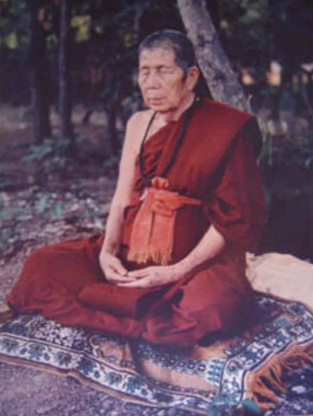 พระผงรูปเหมือน ครูบาพรหมา รุ่นแรก เนื้อดำ วัดพระพุทธบาทตากผ้า จ.ลำพูน (พร้อมบัตรรับรองพระแท้)