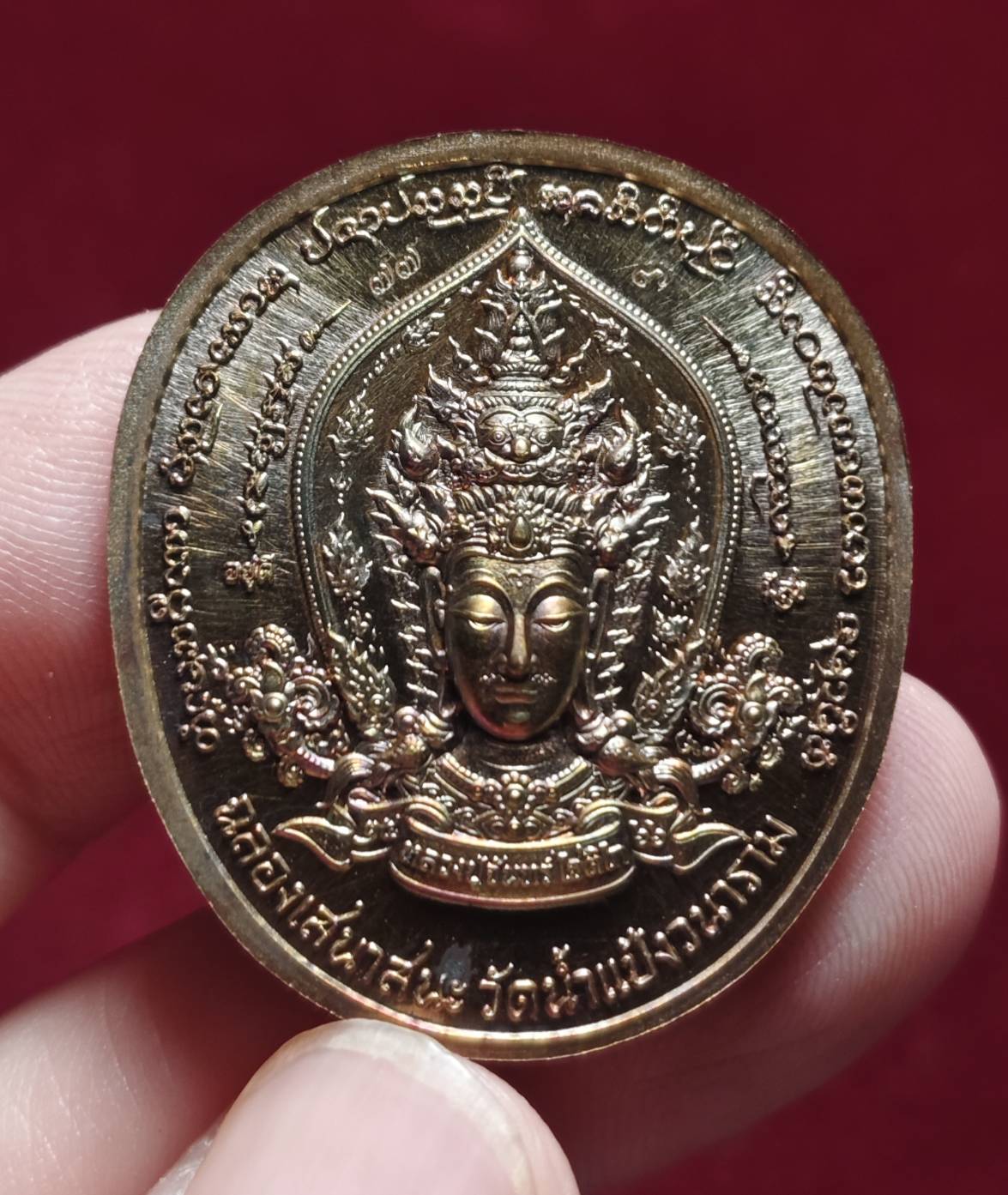 เหรียญหน้ายักษ์ ท้าวเวสสุวรรณ หลวงปู่จันทร์ โชติโก วัดน้ำแป้ง จ.พะเยา ปี 2566 (เนื้อทิพย์ผิวรุ้ง)