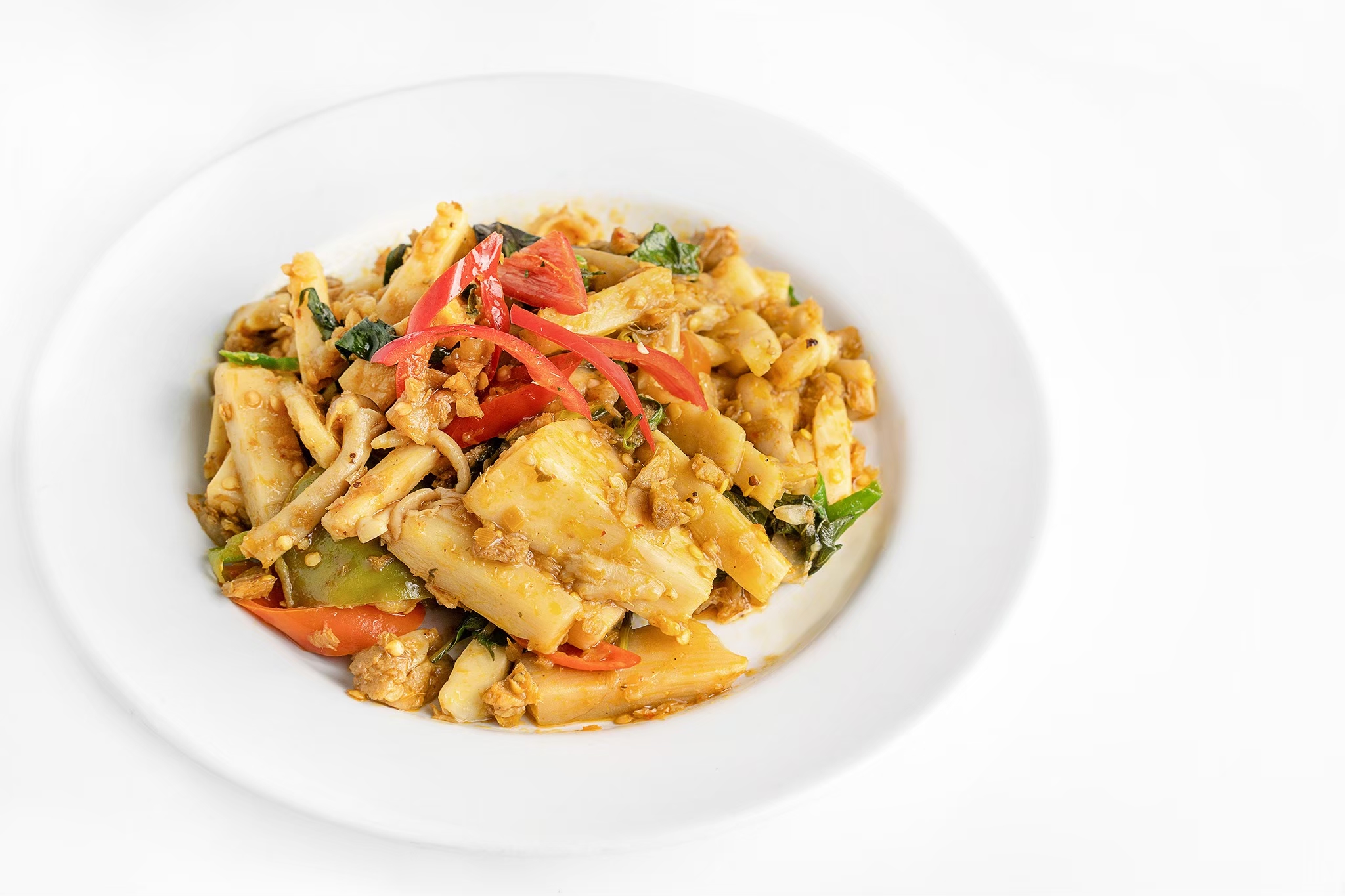 ผัดเผ็ดยอดมะพร้าวอ่อน (Stir fried curry paste with coconut shoot)