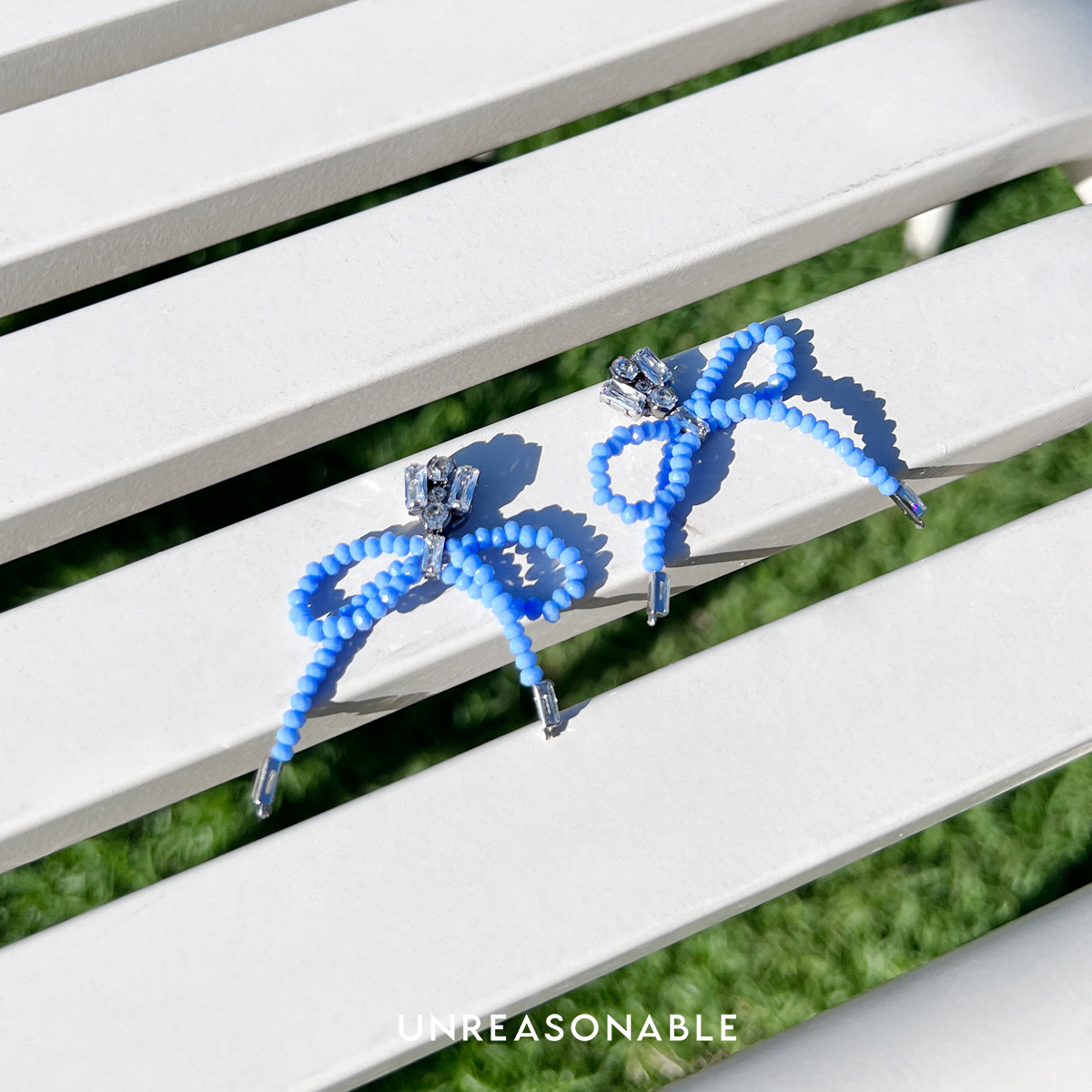 ต่างหูโบว์สีฟ้า ต่างหูคลิป ต่างหูก้านเงินแท้ น้ำหนักเบา UA0955-02 Unreasonable Accessories