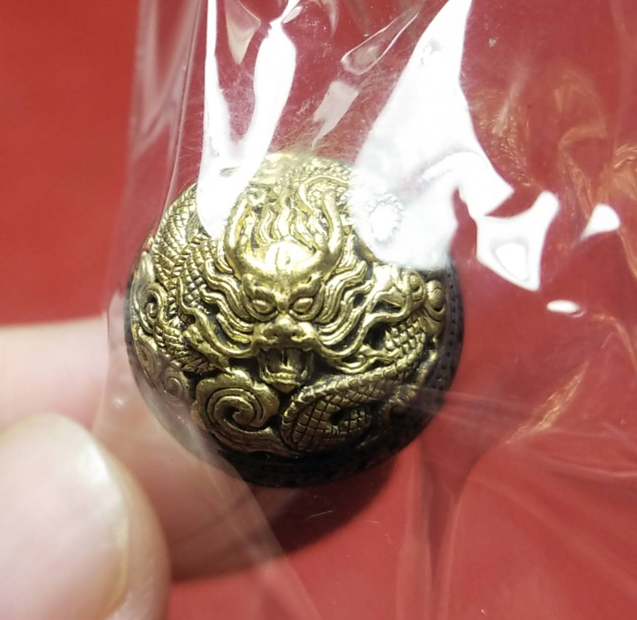 ปรอทกรอ. รุ่น๑ (มังกรนอนกิน ราหูอมจันทร์) เนื้อชนวนเหล็กไหลกินทอง. เลขมงคล536 [หลวงปู่ญาคูจูม จารุวัณโณ] สร้าง1000องค์