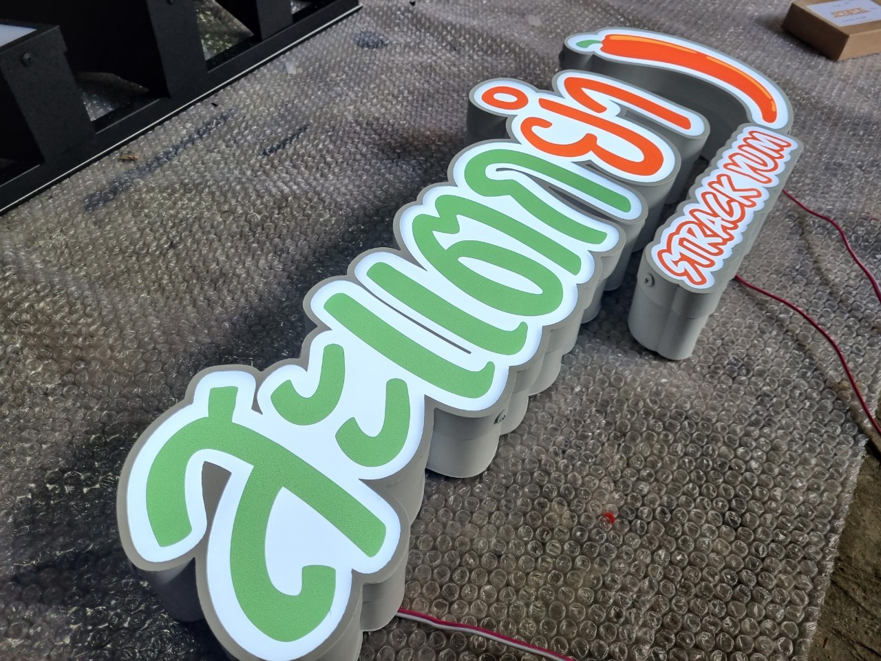 #ป้ายอักษรไฟออกหน้า