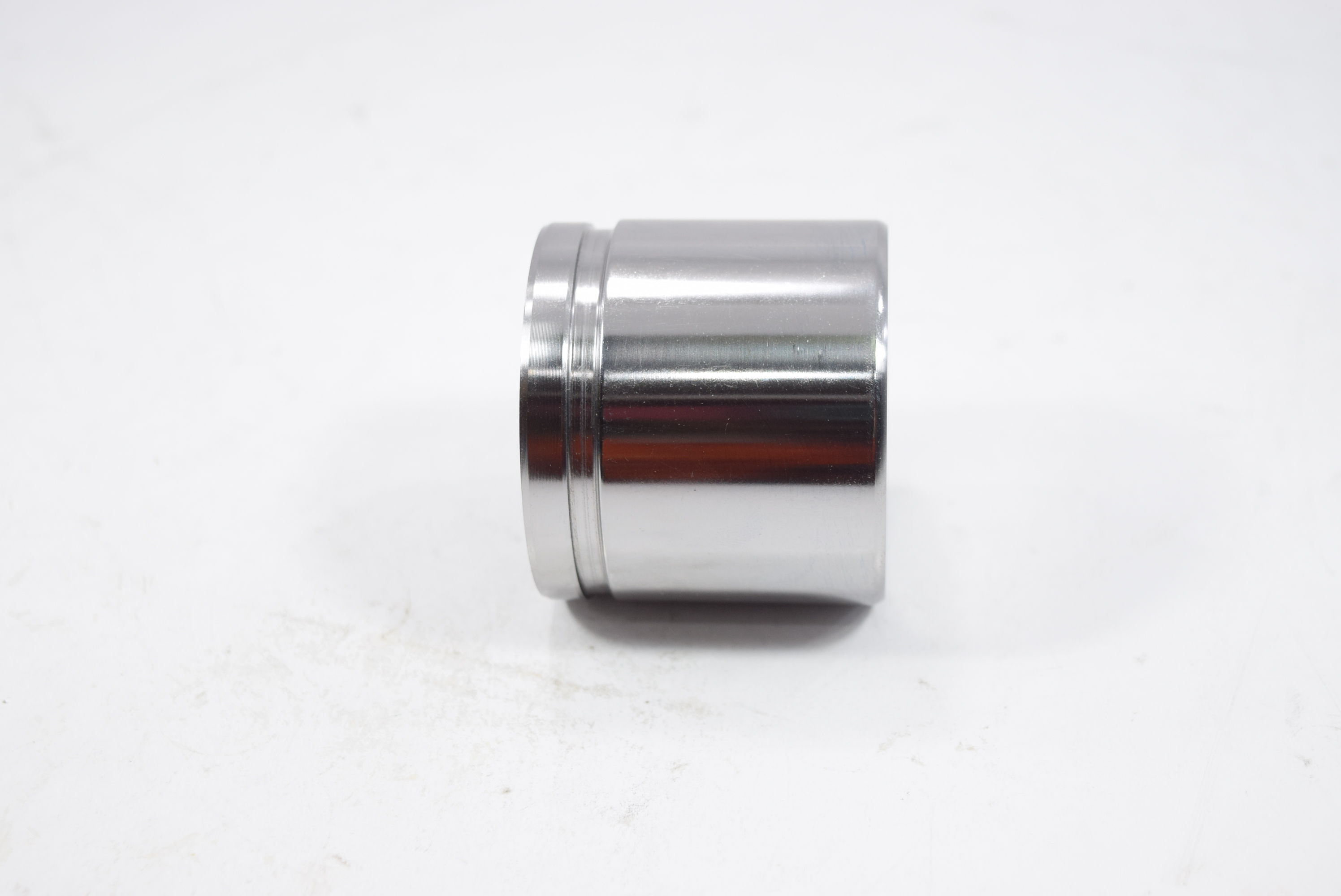 ลูกสูบดิสเบรค NISSAN A.32 CEFIRO 24V, A33 ( 3.0 ) นิสสัน เซฟิโร่ / 3PD-4870 / 41121 - 1E000 / ขนาด วงนอก 57.15 สูง 50.65 (จำนวน 1 ชิ้น) (CALIPER PISTON)