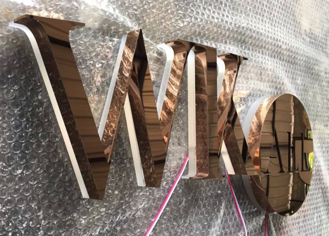 #ป้ายอักษรไฟออกหลัง #ป้ายอักษรสแตนเลสหน้าทองเงาไฟออกหลัง