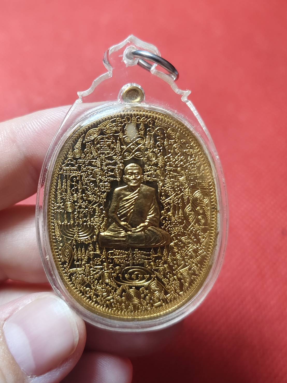 เหรียญลายยันต์เขาอ้อ เนื้อทองทิพย์ หลวงพ่อเงิน วัดโพรงงู จ.พัทลุง ปี 2555(เลี่ยมกรอบพร้อมใช้)