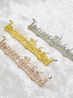 เข็มกลัดอักษร