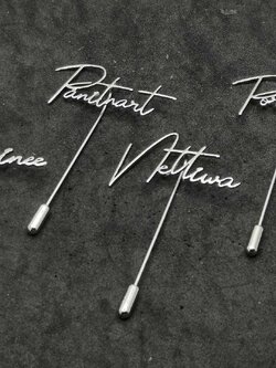 พินติดสูทอักษร