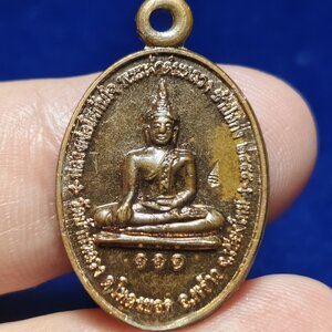 เหรียญหลวงพ่อโตทันใจ พระเจ้าต๋นหลวง หลังหลวงพ่อโมลี หลวงพ่อแสนแช่ วัดบ้านหลวง จ.เชียงใหม่ ปี2555