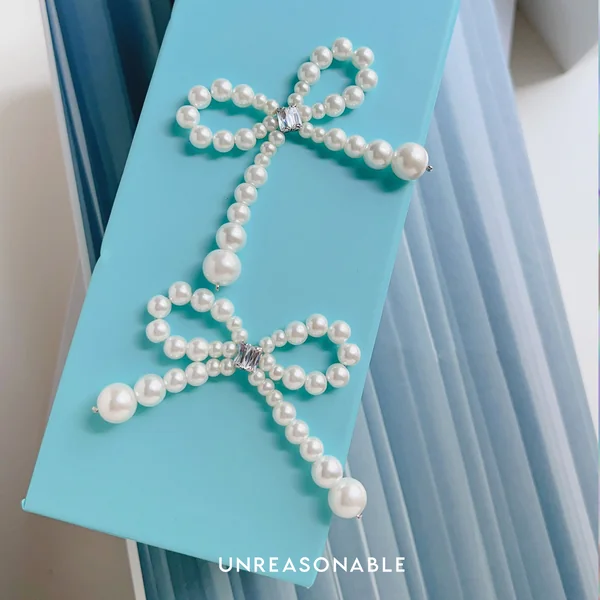 ต่างหูโบว์ มุกแก้ว Glass Pearl ต่างหูคลิป ต่างหูก้านเงินแท้ สีขาว UA0937-01 Unreasonable Accessories image 3 ต่างหูโบว์ มุกแก้ว Glass Pearl ต่างหูคลิป ต่างหูก้านเงินแท้ สีขาว UA0937-01 Unreasonable Accessories image 3
