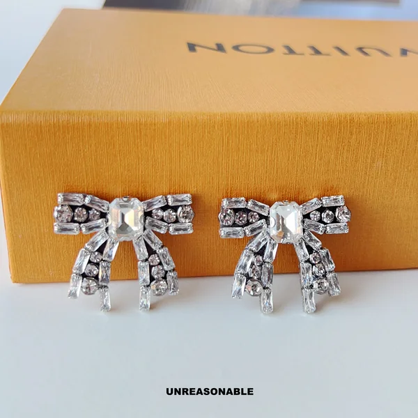 Glitter Riot Bow earrings. ต่างหูโบว์คริสตัล สีขาว UA0983-01 Unreasonable Accessories image 5 Glitter Riot Bow earrings. ต่างหูโบว์คริสตัล สีขาว UA0983-01 Unreasonable Accessories image 5